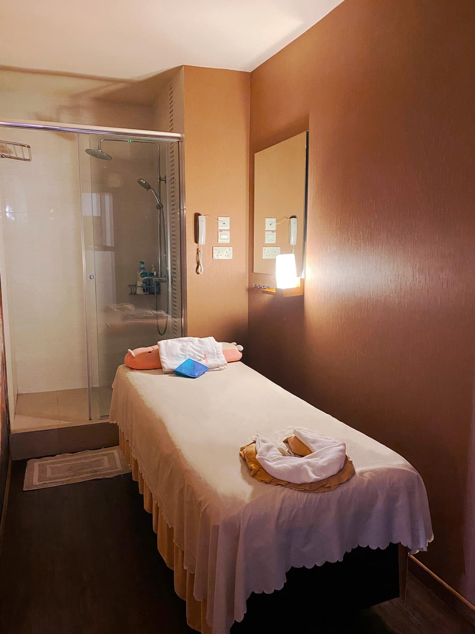 Private massage treatment room with shower