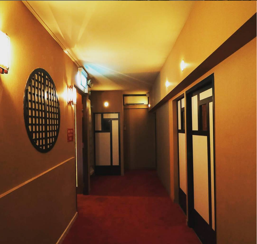 Calming spa corridor with soft lighting